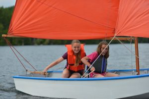Sailing camp students enjoying a day on the water on Indian Lake