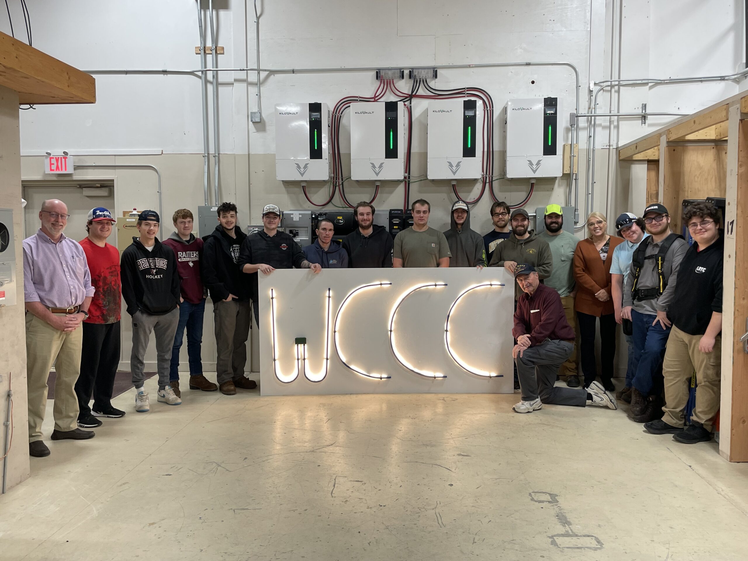 RCE students pose with new LED sign