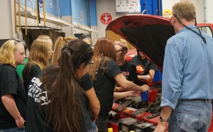 WCCC Automotive Instructor Ron O'Brien provided the girls that attended his workshop some of the basics of automotive maintenance.