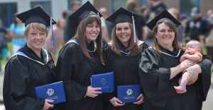 Group of women in graduation gowns